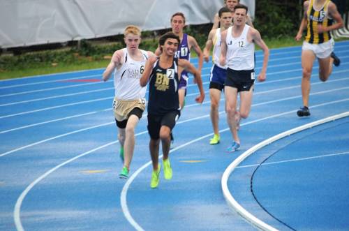 Keelan followed when Garrett Lee made his move with 200 meters to go.  Photo by Steven Bugarin.